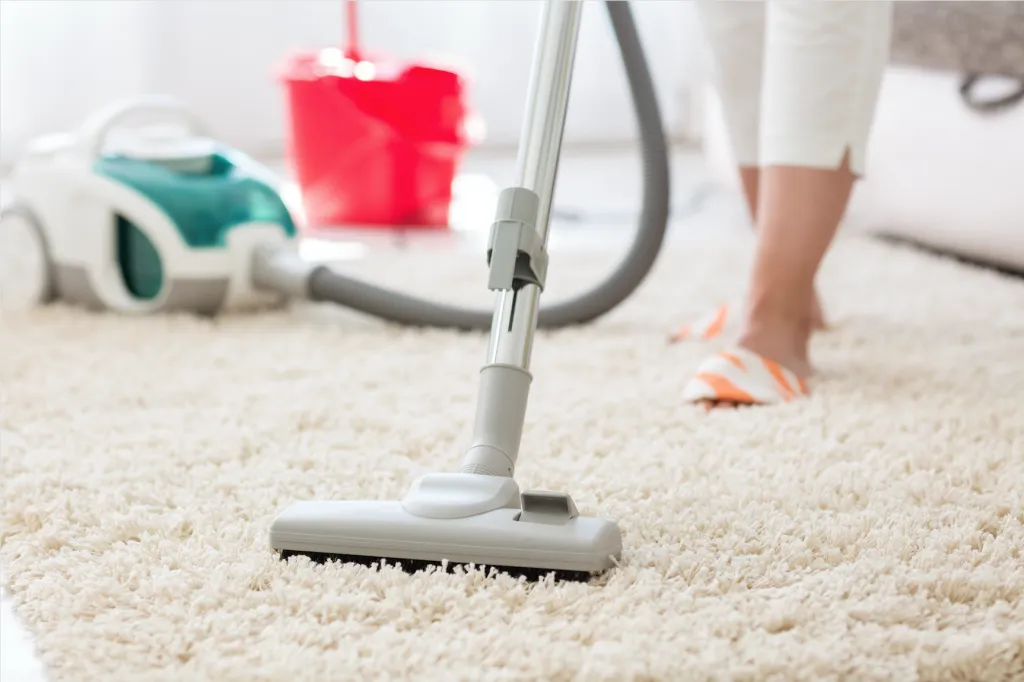 vacuum over a carpet