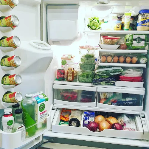 open refrigerator full of food