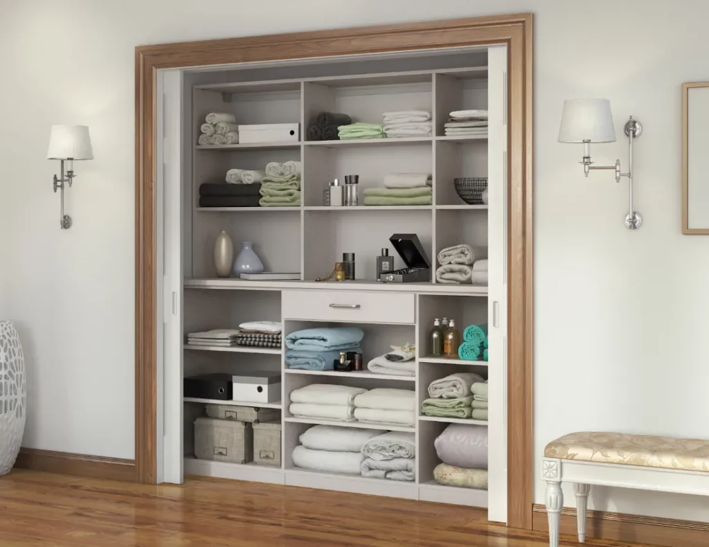 linen closet with sheets inside depicting how to store sheets in a home